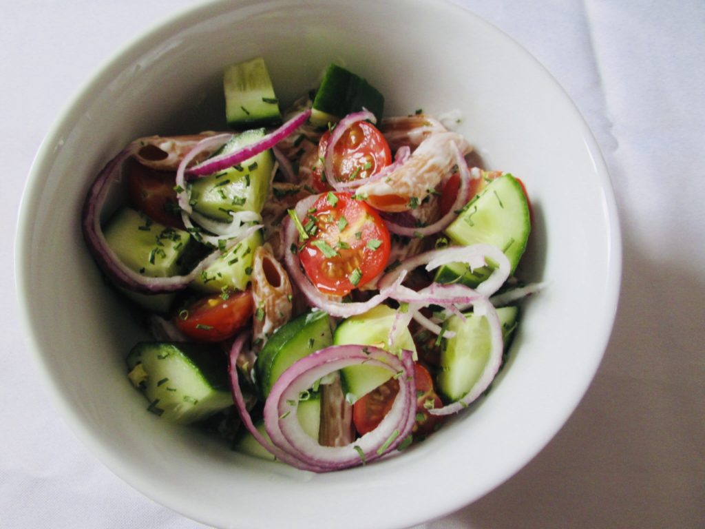 gluten free pasta salad in a white bowl.