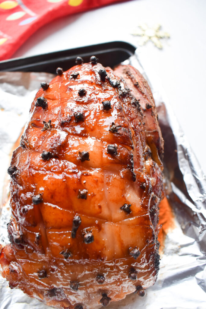 Honey Glazed Ham in roasting tin.