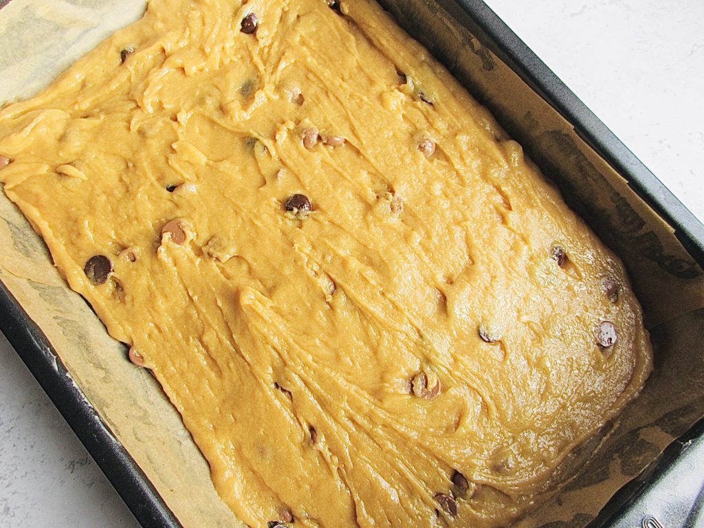 Peanut Butter Banana and Chocolate Blondie Bars batter in Baking Tray