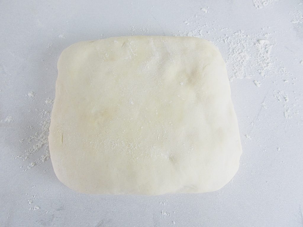 dough sealed with butter block inside
