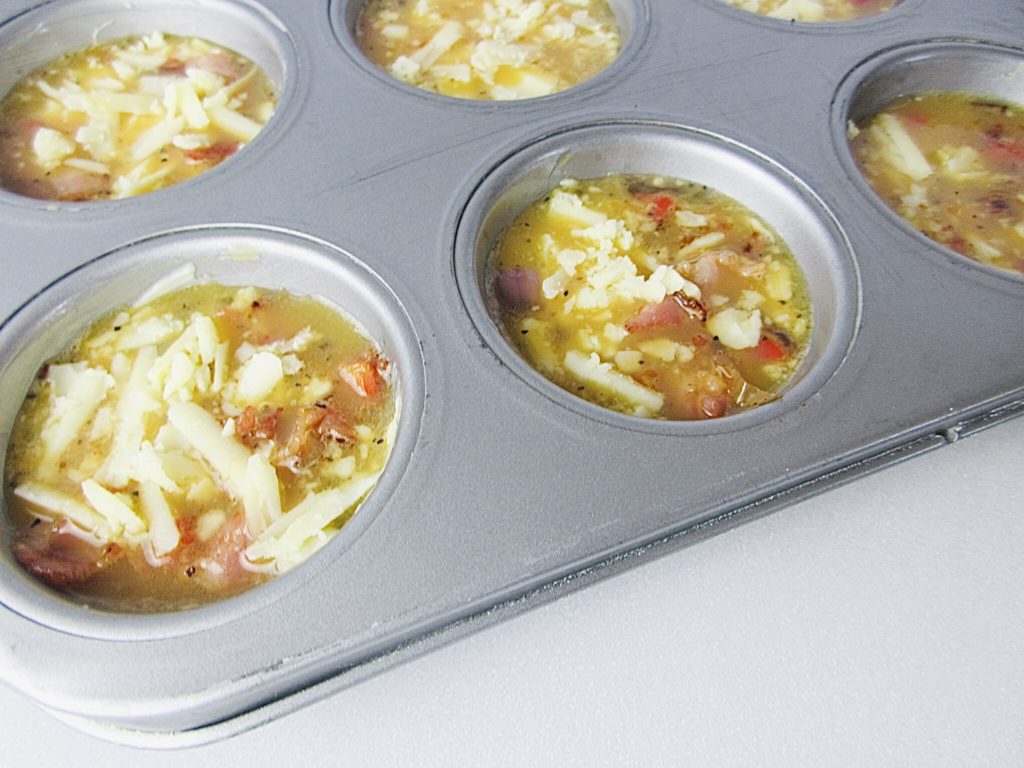 Cheesy Baked Egg and Bacon Muffins