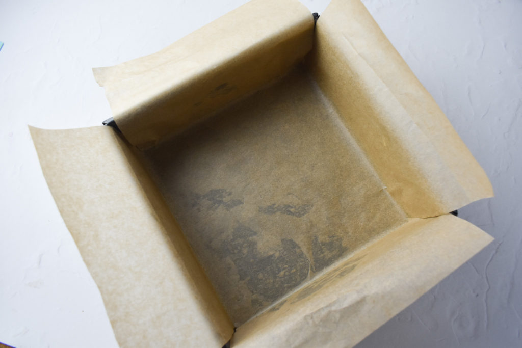 Line a square baking tin