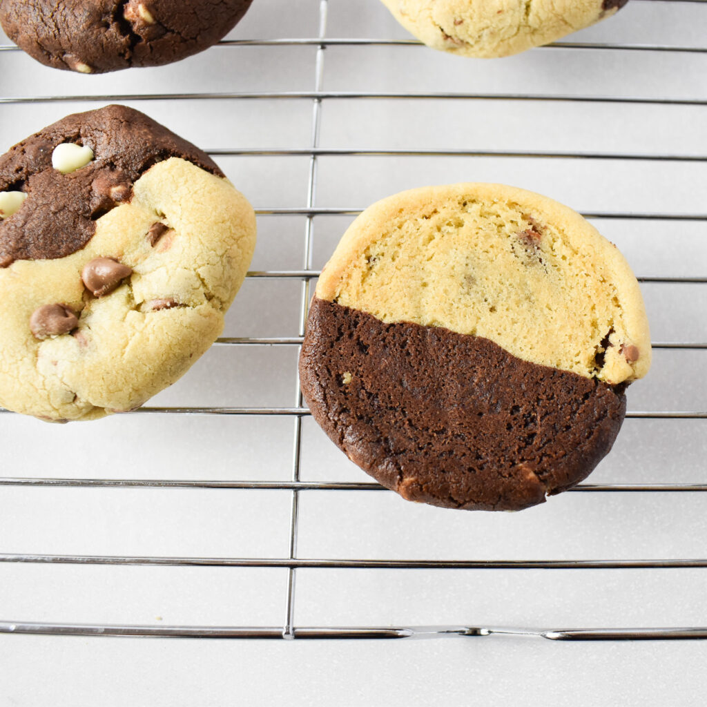 Chocolate chip swirl cookies on a cooling rack.