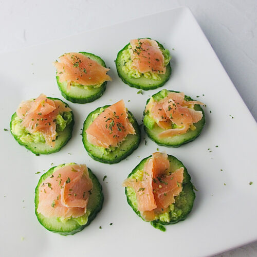 Salmon avocado on cucumber slices