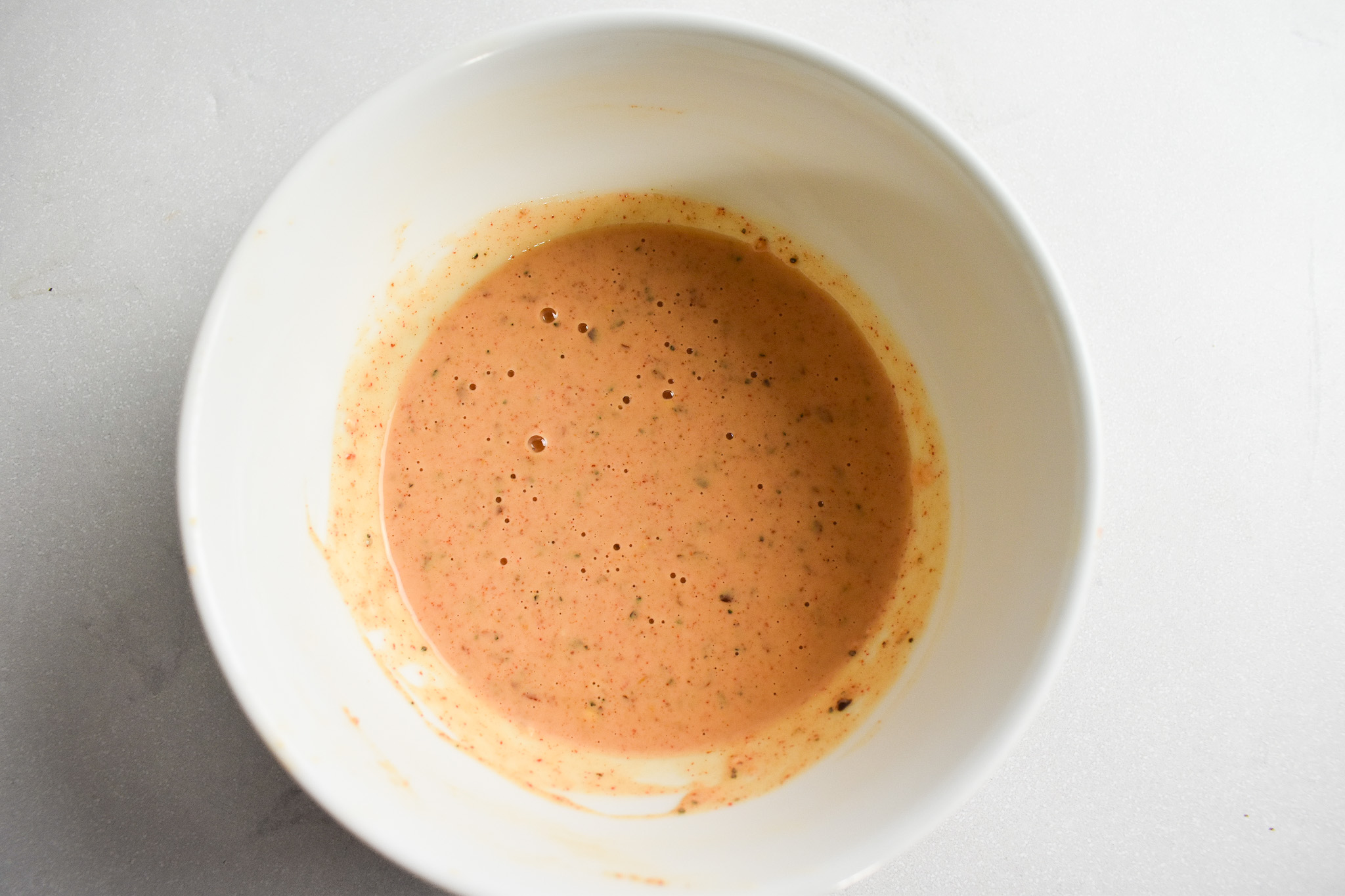 Seasoned batter in bowl