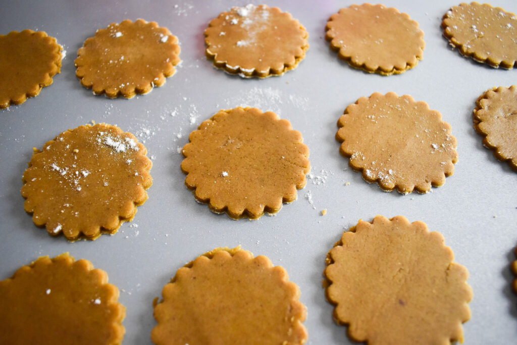 ginger biscuits on baking sheet