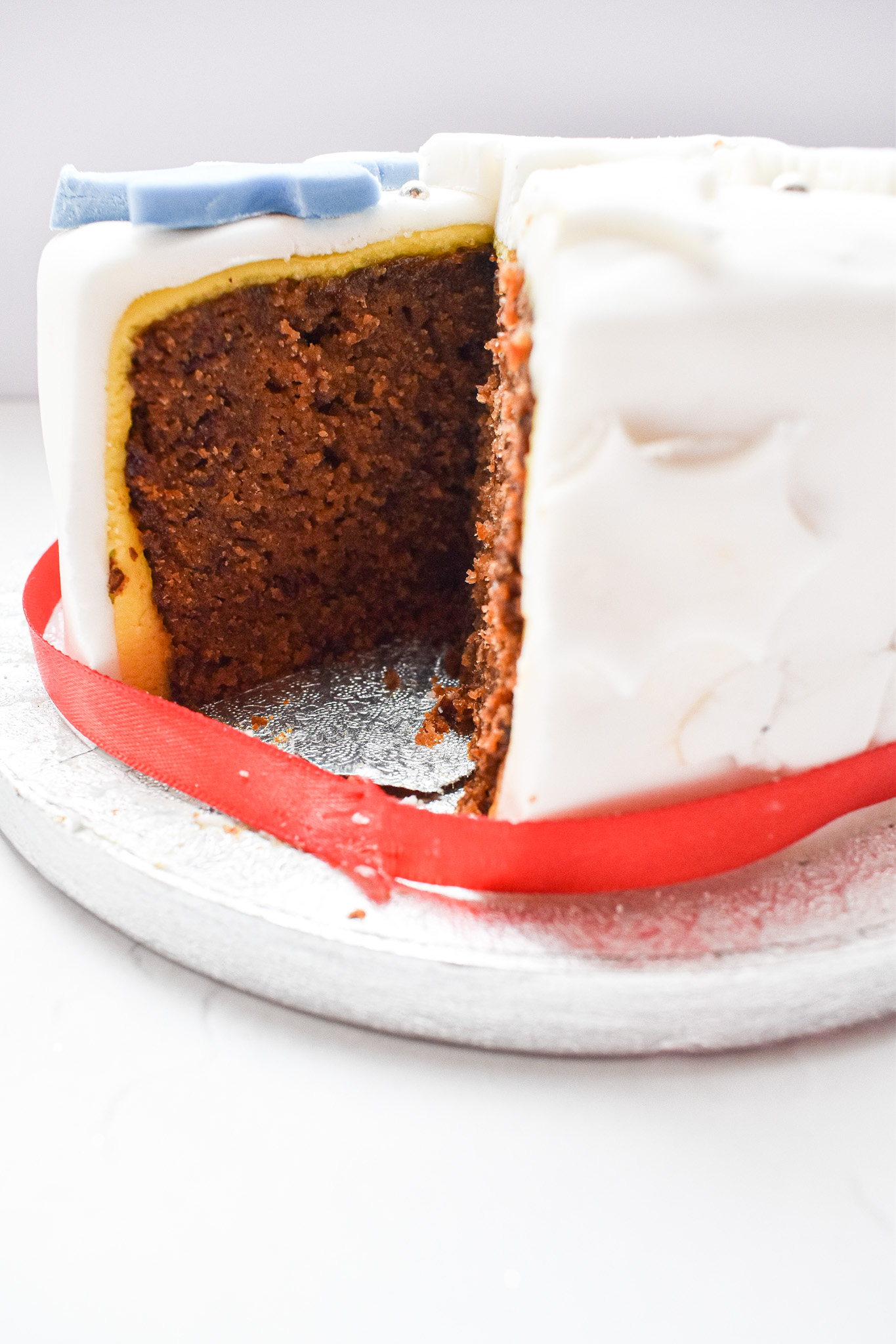 Fruit cake with a piece cut out