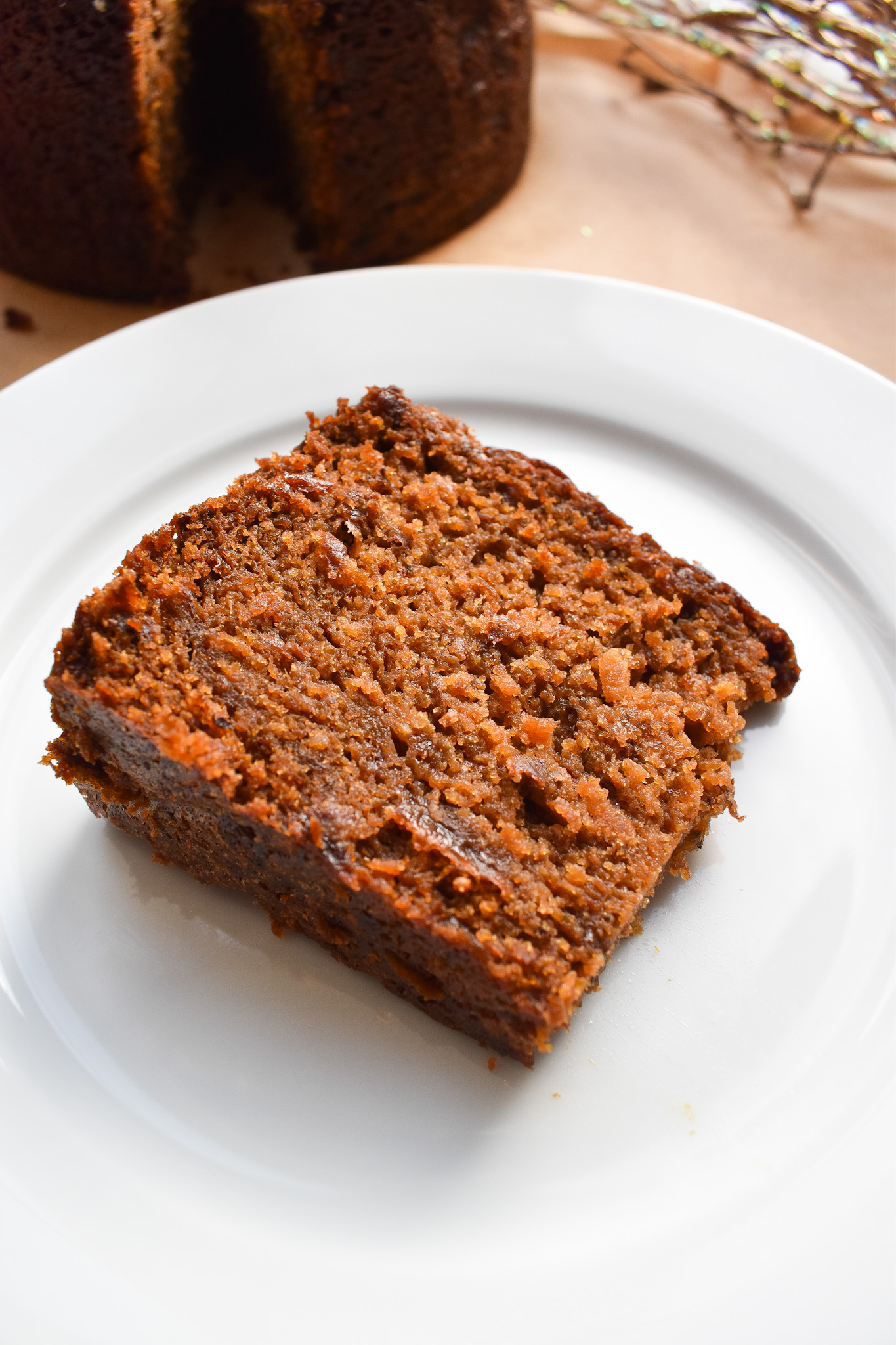 Slice of fruit cake on plate