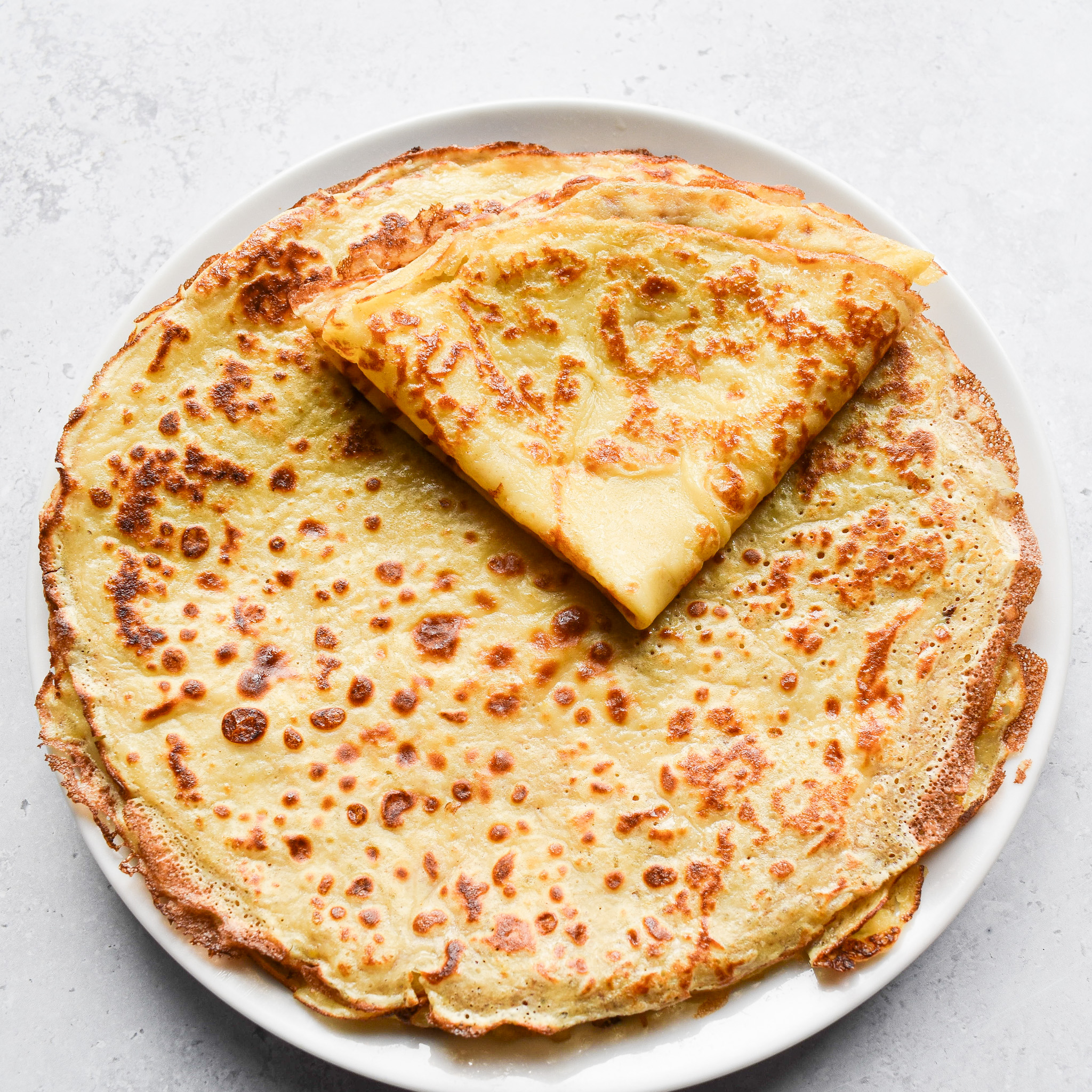 folded crepe on stack of crepes